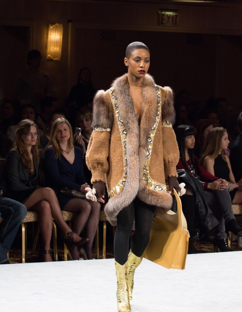knitwear, fashion, fashion show, runway, catwalk, model, woman, african american, black woman, knitted coat, fashion show, fashion show, fashion show, fashion show, fashion show, runway, catwalk, african american